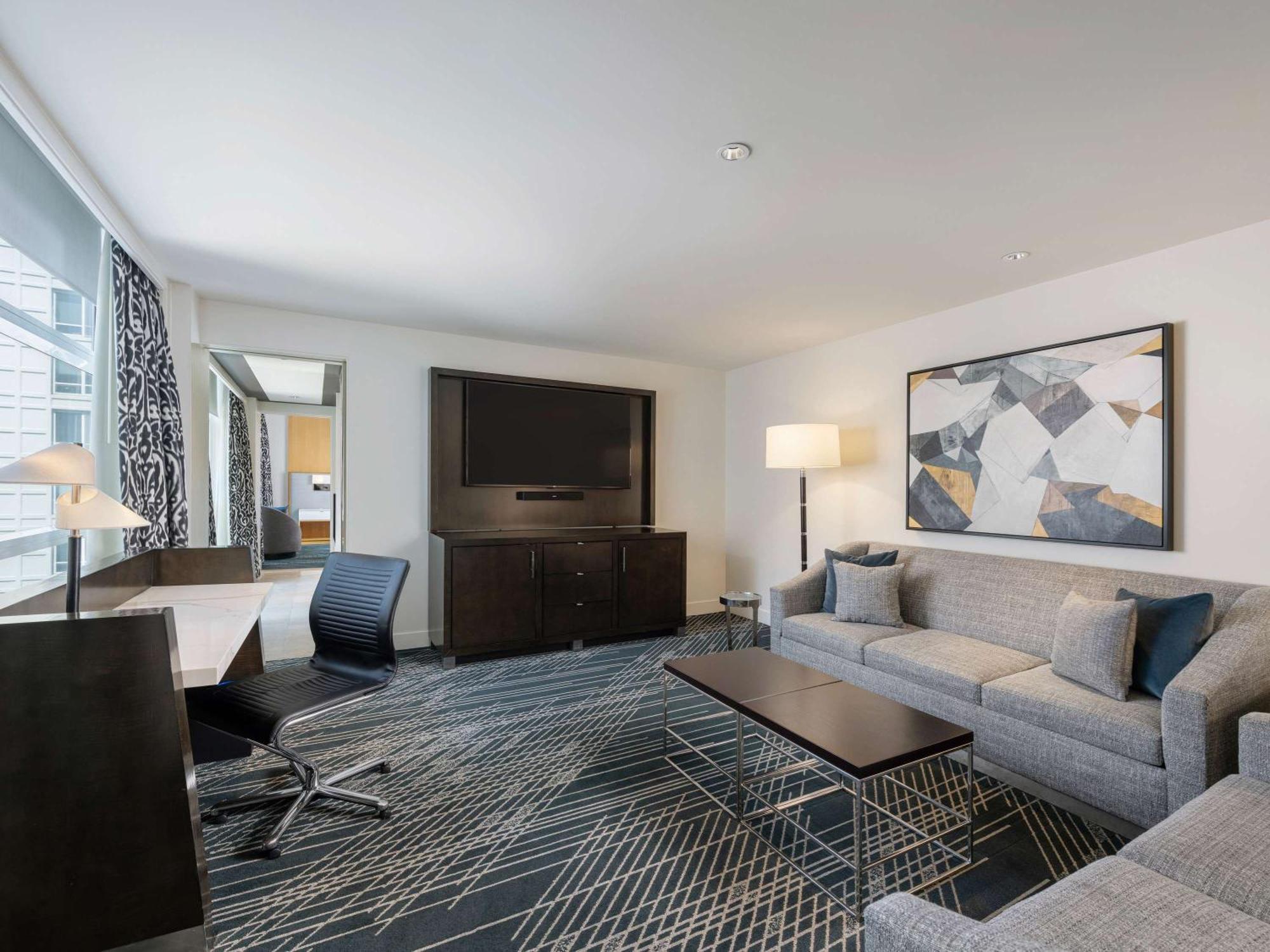 Sofitel Chicago Magnificent Mile Hotel Exterior photo Living room of a suite at the Hilton San Francisco Union Square